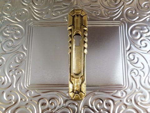 Entrée clé ancienne pour serrure bronze art déco