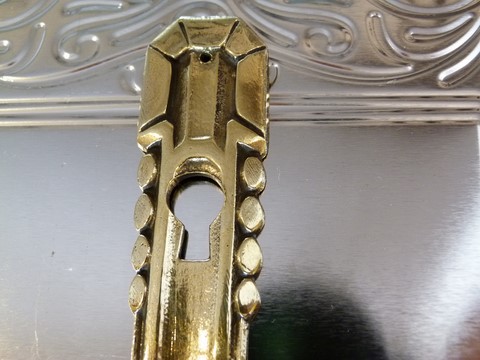 Entrée clé ancienne pour serrure bronze art déco