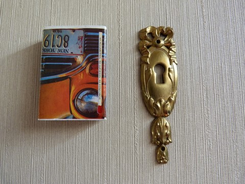 Entrée clé ancienne en bronze ruban et noeud Louis XVI